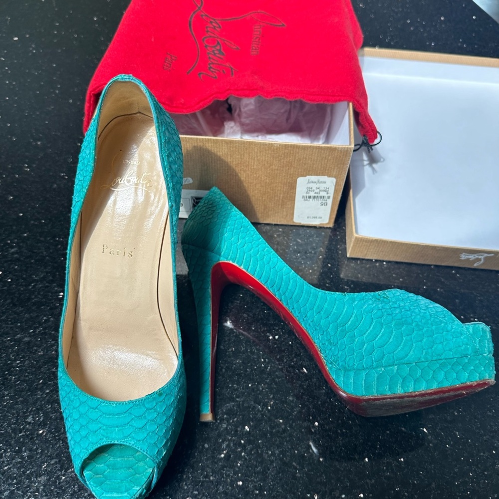Christian Louboutin size 39 loved them but too high for me to walk in :(